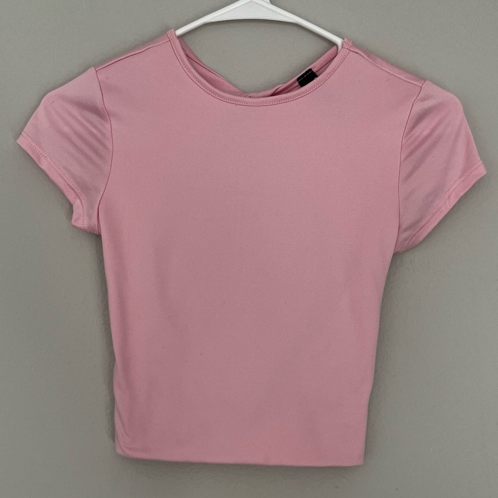 Windsor pink cropped top with a stretchy fit and open back design